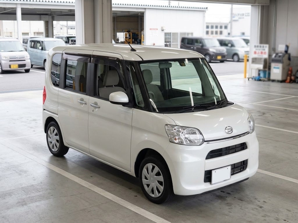 White Daihatsu Tanto in a Japanese inspection facility