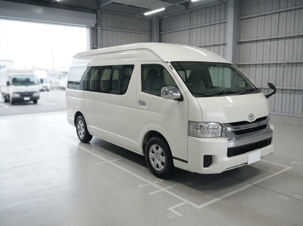 White Toyota Hiace in a Japanese inspection facility